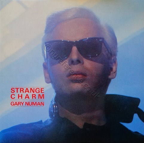 Strange Charm — 1986